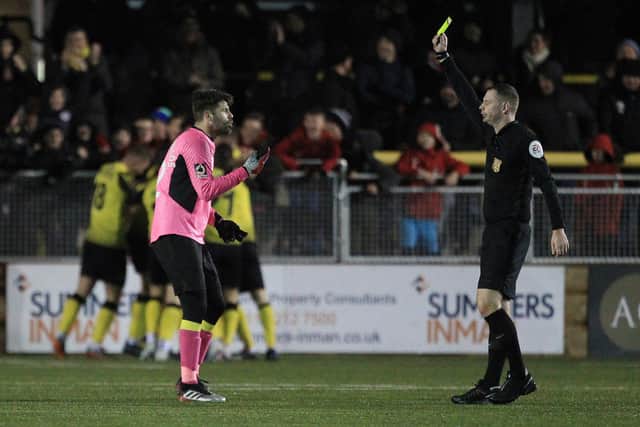 Dimitrios Konstantopoulos of Hartlepool United gets shown a yellow card during The Buildbase FA Trophy match between Harrogate Town and Hartlepool United at Wetherby Road, Harrogate on Saturday 14th December 2019. (Credit: Mark Fletcher | MI News)