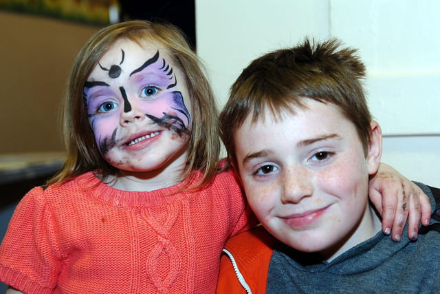 Jayden Facchini poses alongside his cousin Lorenza as they wait to take part in an Easter egg trail in 2013.