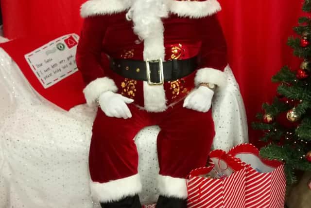 Peter Richardson dressed as Santa.