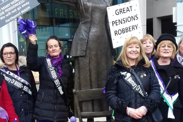 Members of the Hartlepool WASPI group during the unveiling of a plaque at a statue of Suffragette Emmeline Pankhurst in Manchester in March in memory of more than 90,000 women who died without receiving their pension after the Government increased the age for women.
