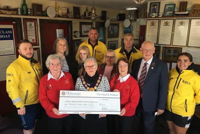 Society Provisional Grandmaster of Cleveland and Durham District Dot Talbot presenting the cheque to Beryl Sherry and Ann Wray (left) of the Hartlepool RNLI Enterprise branch with RNLI volunteer crewmembers and Oddfellows friendly society members. Photo: Tom Collins