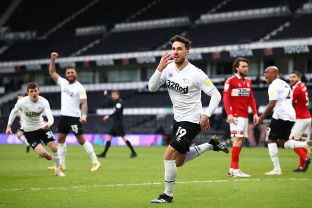 Lee Gregory of Derby County celebrates after scoring their side's first goal against Middlesbrough.