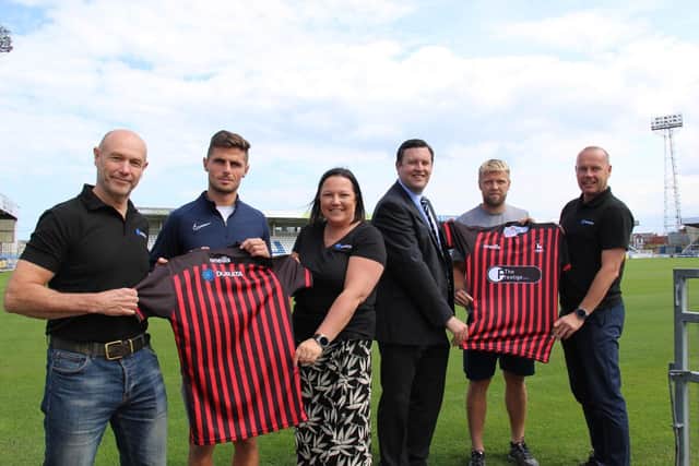From left, Durata's installations director Andy Mullen, Pools midfielder Gavan Holohan, Durata secretary Alison McGee, Pools midfielder Nicky Featherstone, Prestige Group's financial director Richard Attwood and Durata's managing director John McGee. Picture courtesy of Hartlepool United