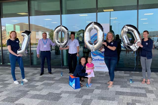 Water Babies celebrates its 1,000th young swimmer. Pictured from left are Debbie Smith (Water Babies) Neil Drew (Ingleby Barwick Leisure General Manager), Helen Eyeington (Ingleby Barwick Leisure, Duty Manager), Laura Blewitt (Water Babies), Darcy Webster, Pamela Hargreaves (Water Babies Chief Executive) and Riccy Bradshaw (Water Babies).