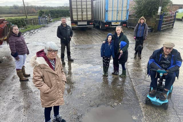 Sue Leonard, front left, with, from left, Amelia and Mark Leonard, Joanne Grieves with her children Daniel and Emily, Elizabeth Charlton and Fred Grieves at the family's farm close to Elwick. Picture by FRANK REID