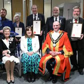 Rear from left, Hartlepool Coastguard members Gary Carden and James Bowen, former councillor Shelia Griffin, artist George Colley, former deputy lieutenant Peter Bowes and former councillor Carl Richardson. Front from left, Lord Lieutenant of County Durham Sue Snowdon, Hartlepool Borough Council managing director Denise McGuckin and the ceremonial Mayor of Hartlepool councillor Shane Moore.