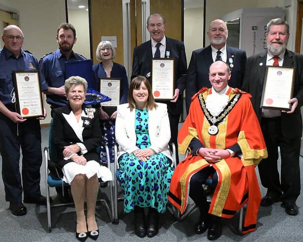 Rear from left, Hartlepool Coastguard members Gary Carden and James Bowen, former councillor Shelia Griffin, artist George Colley, former deputy lieutenant Peter Bowes and former councillor Carl Richardson. Front from left, Lord Lieutenant of County Durham Sue Snowdon, Hartlepool Borough Council managing director Denise McGuckin and the ceremonial Mayor of Hartlepool councillor Shane Moore.
