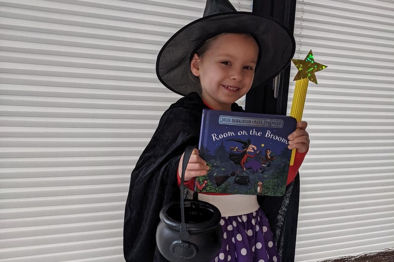 Harley is dressed as the witch from Room on the Broom.