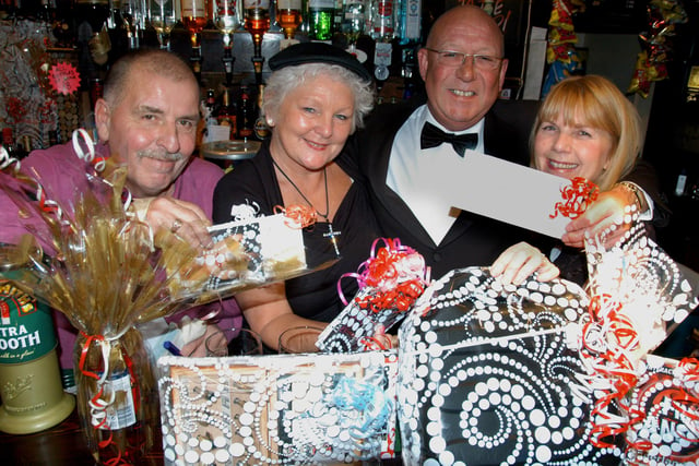 A charity night at the Monument pub in Penshaw in 2009. Pictured are Ernie Rowntree, Mary Rowntree, landlord Geoff Mendham and Viv Murphy.