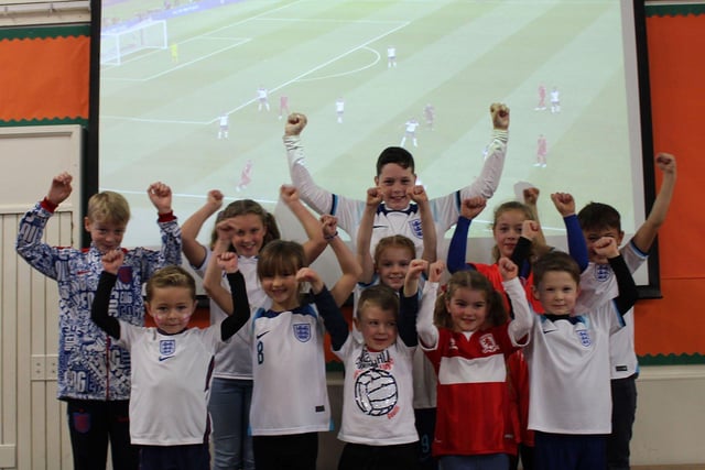 England fans at Fens Primary School celebrate the victory over Iran.