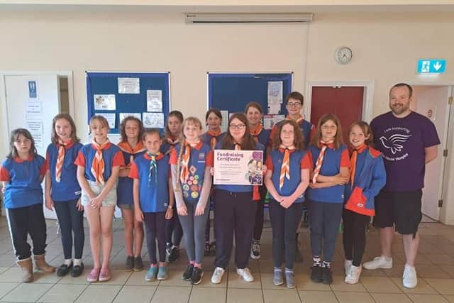 The Brownies and Guides managed to raise hundreds of pounds for the hospice.