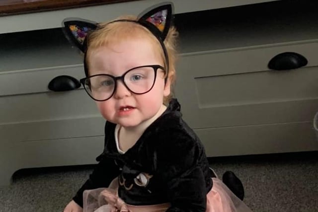 Fifteen-month-old Willow-Grace dressed up as a cat for Halloween.