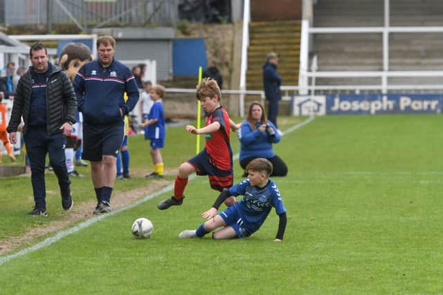 Two youngsters get stuck in during the second Annual Youth Alliance Football Tournament at Hartlepool United.