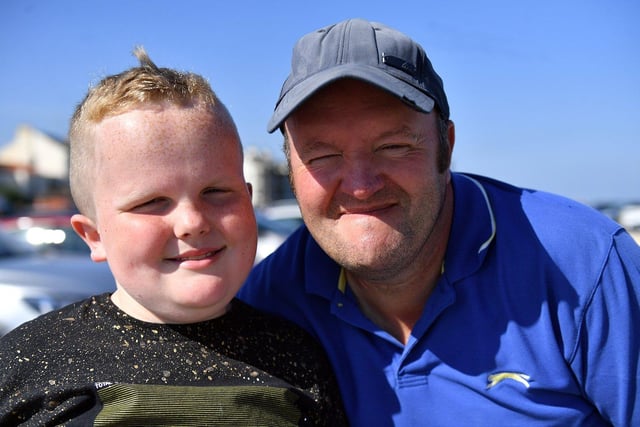 Brian Burham and his son Haydan in the sun at Seaton Carew.