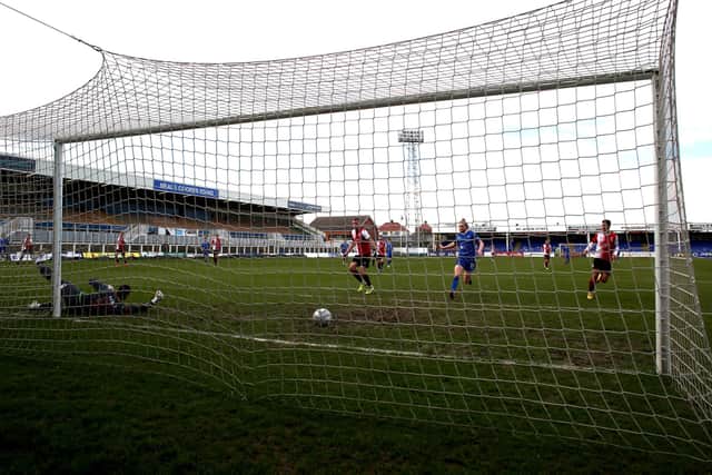 Rhys Oates of Hartlepool United puts his side 1-0 up during the Vanarama National League match between Hartlepool United and Woking at Victoria Park, Hartlepool on Saturday 20th March 2021. (Credit: Chris Booth | MI News)
