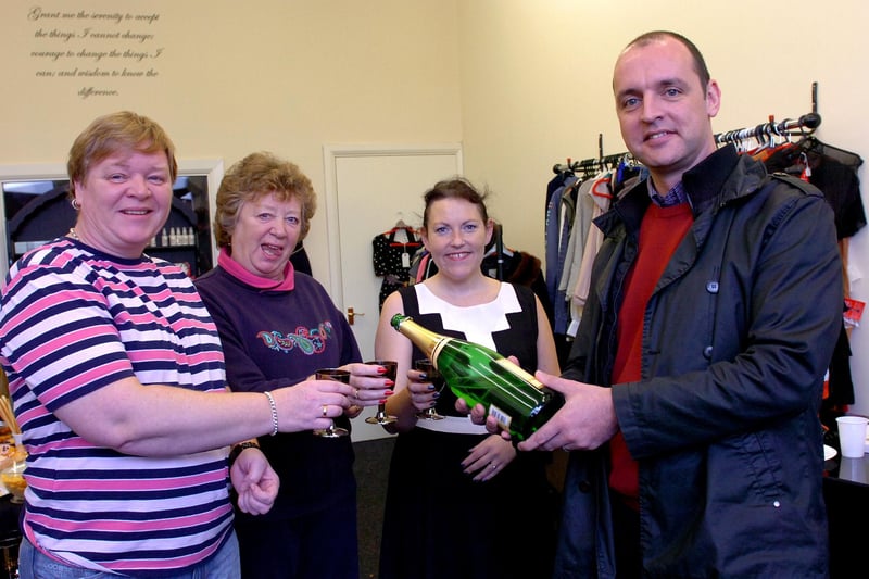 Mayor Stuart Drummond pours champagne to celebrate the opening of the new Thick and Thin fashion shop in Park Road. Pictured are Cate Thompson, owner, Joanne lake and Val Lake.