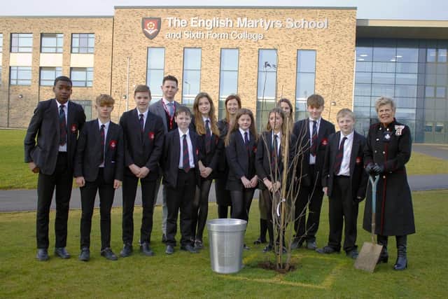 His Majesty's Lord Lieutenant of County Durham Sue Snowdon (right) joins students at English Martyrs School and Sixth Form College in planting a tree as part of the late Queen's Green Canopy initiative.