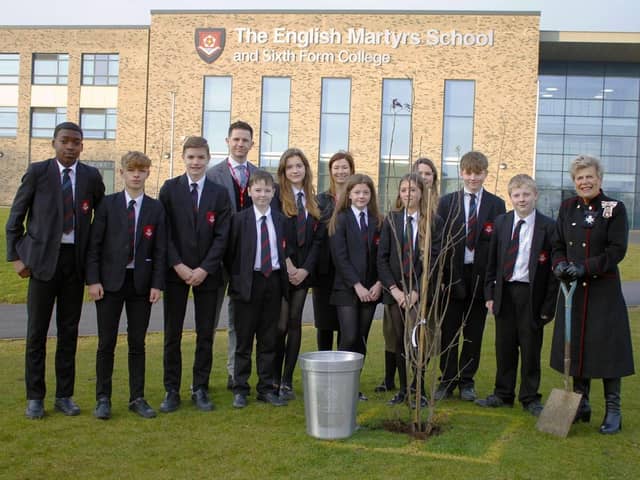 His Majesty's Lord Lieutenant of County Durham Sue Snowdon (right) joins students at English Martyrs School and Sixth Form College in planting a tree as part of the late Queen's Green Canopy initiative.