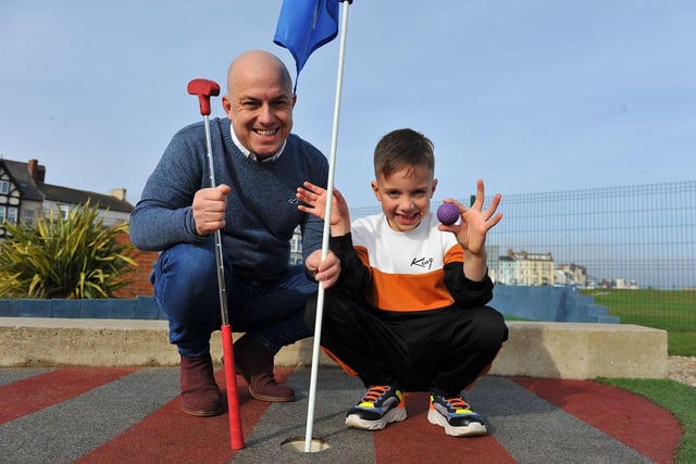 James, left, and Leo Dawson at the Seaton Carew crazy golf course.  Picture by FRANK REID