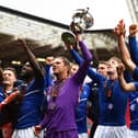 Players of Hartlepool United celebrate with the Vanaram National League Trophy during the Vanarama National League Play-Off Final match between Hartlepool United and Torquay United at Ashton Gate on June 20, 2021 in Bristol, England. (Photo by Harry Trump/Getty Images)