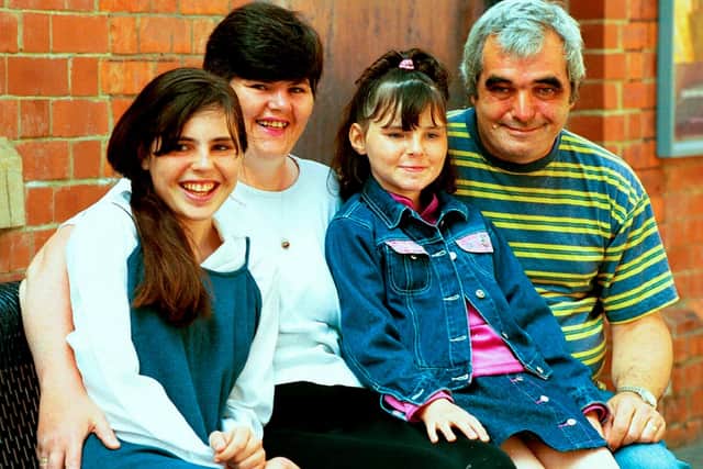 Elaine Swift, far left, and sister Christine, second right, with parents Fiona and Ben in a picture from the 1990s.