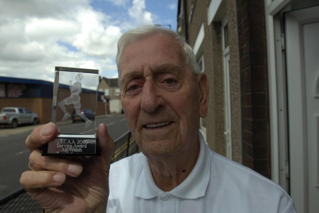 Alf Wash, of Brenda Road, is presented with a sports award in 2009.