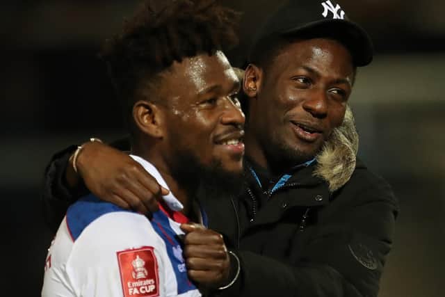 Hartlepool United's Rollin Menayese (L) and Mouhamed Niang during the FA Cup Second Round match between Hartlepool United and Harrogate Town at the Suit Direct Stadium. (Credit: Mark Fletcher | MI News)