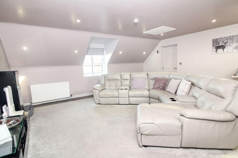 This spacious lounge is just one of five reception areas and could easily be converted into a home cinema, games room, or children’s play area.