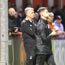 Hartlepool United manager John Askey, left, on the touchline at Tuesday's clash at Altrincham.