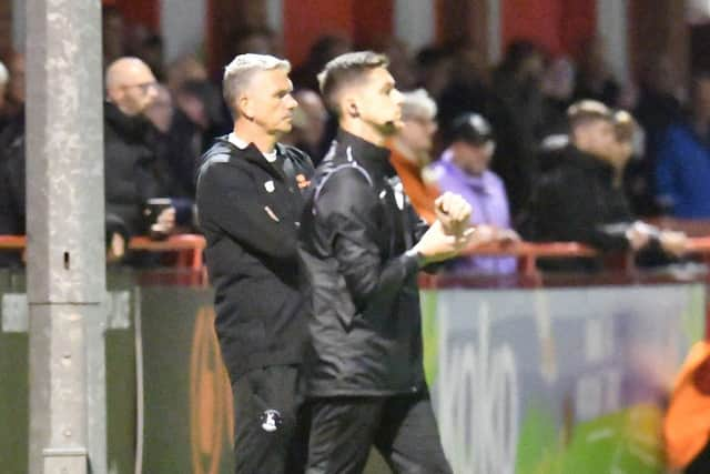 Hartlepool United manager John Askey, left, on the touchline at Tuesday's clash at Altrincham.