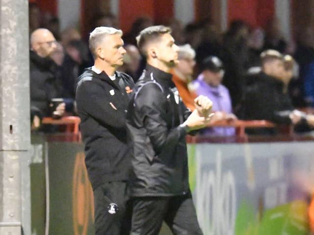 Hartlepool United manager John Askey, left, on the touchline at Tuesday's clash at Altrincham.