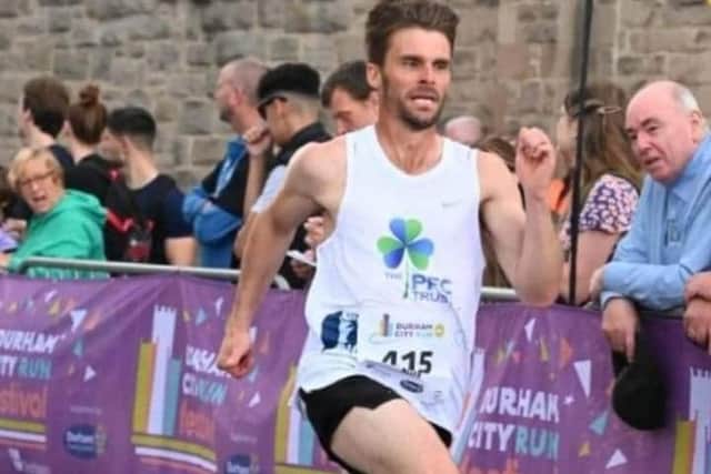 Keith Hutchinson at the Durham City Run Festival, sporting a top sponsored by the PFC Trust.
