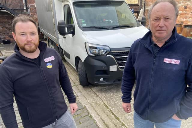 Kevin Hogg (left) with his dad Graham with the loaded van that will be driven to Poland. Picture by FRANK REID