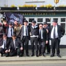 The Hartlepool United Irish Supporters Club members who made the trip to Dorking dressed as The Blues Brothers.