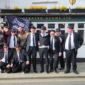 The Hartlepool United Irish Supporters Club members who made the trip to Dorking dressed as The Blues Brothers.