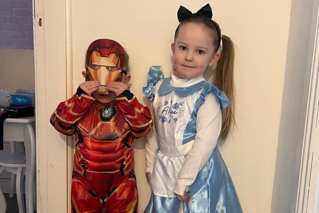 Sophia and Roman Howie as Alice and Iron Man.