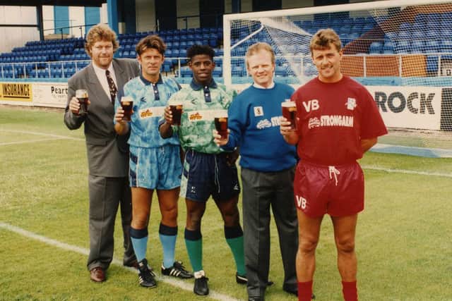 Lenny Johnrose, centre, models Hartlepool United's new kit at the start of the 1993-94 season. Among those also pictured are then chairman Garry Gibson, far left.