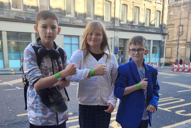 The children with their wristbands for the queue to see Her Majesty the Queen.