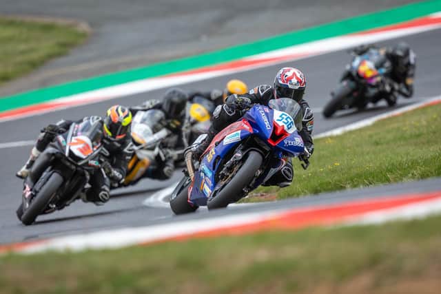 Tommy Fielding leads the race at the Sun Pro Shop Cup 600 and Pirelli Super Series 600 Race 11 at Brands Hatch, in London, in 2023. Picture by Michael Wincott Photography.