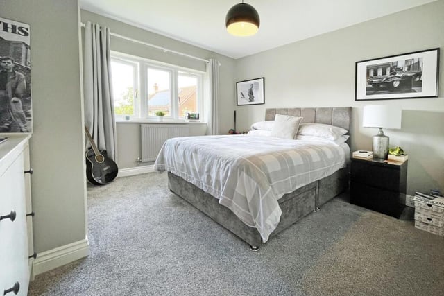The master bedroom provides plenty of storage space and has an en suite.