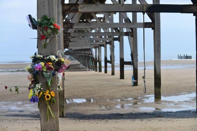 Flowers and cards left in memory of Matthew Sherrington at Steetley Pier. Picture by FRANK REID