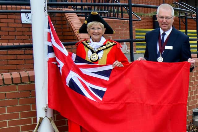 From left, The Mayor of Hartlepool, Councillor Brenda Loynes and the Mayor's consort and husband, Cllr Dennis Loynes, prepare to raise the Red Ensign. Picture by FRANK REID.