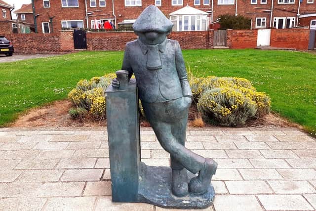 The Andy Capp statue outside the Pot House pub, on the Headland, Hartlepool.