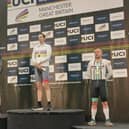 Adam Brooks, right, collecting his medal at the World Masters Tracks Championship in Manchester this month