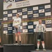 Adam Brooks, right, collecting his medal at the World Masters Tracks Championship in Manchester this month