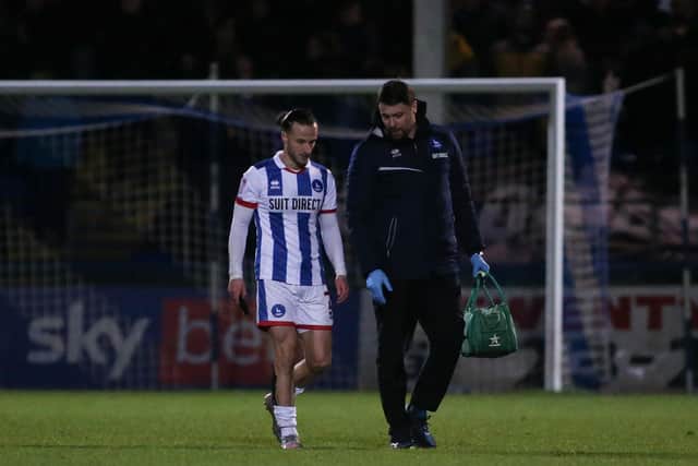 Jamie Sterry was forced off injured in Hartlepool United's defeat against Mansfield Town. (Credit: Michael Driver | MI News)