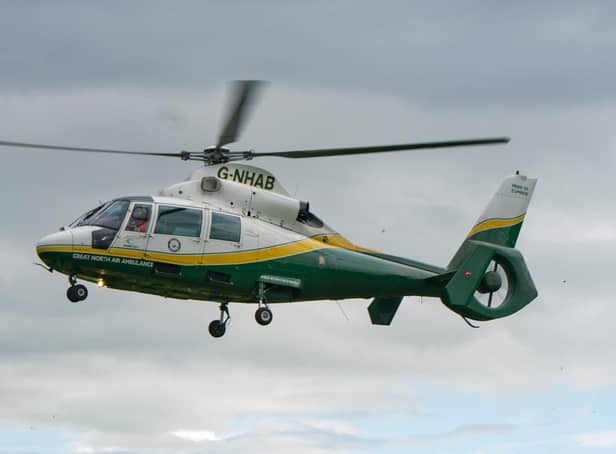 A casualty has been taken to hospital after the A1(M) was temporarily closed to allow the air ambulance to land.