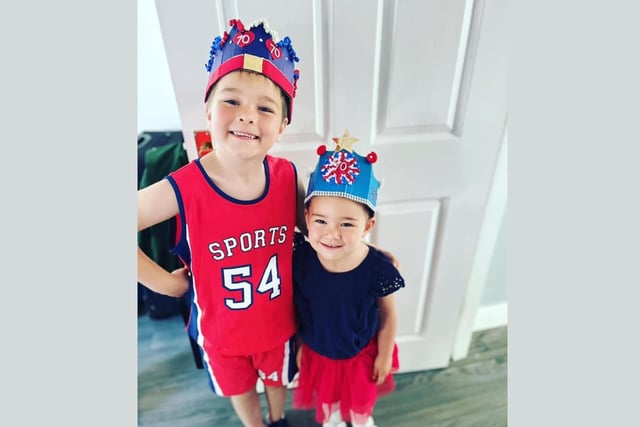 William Lewis, age 6, and Isla-May Lewis, age 2, show off their crowns.