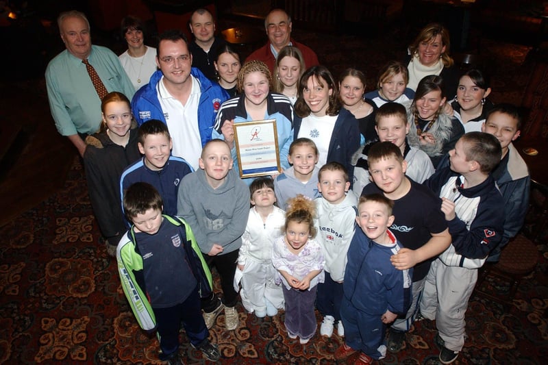Hartlepool Mayor Stuart Drummond presents an award at the pub to youngsters in 2004.