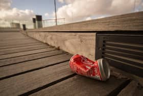 Dropped cans have the potential to become a danger if they are dropped on grassy areas.